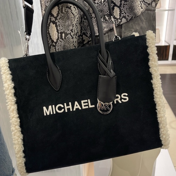 Michael Kors Handbags - MICHAEL KORS Mirella Medium Suede and Faux Shearling Tote Bag
Black
NWT